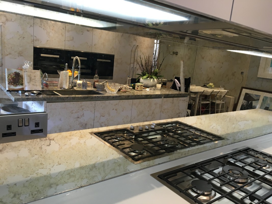 Mirror glass splashback in Thornton Heath luxury kitchen